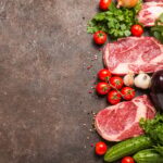Raw beef meat and vegetables