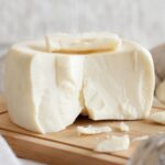 South Italian cheese cacioricotta with a grater
